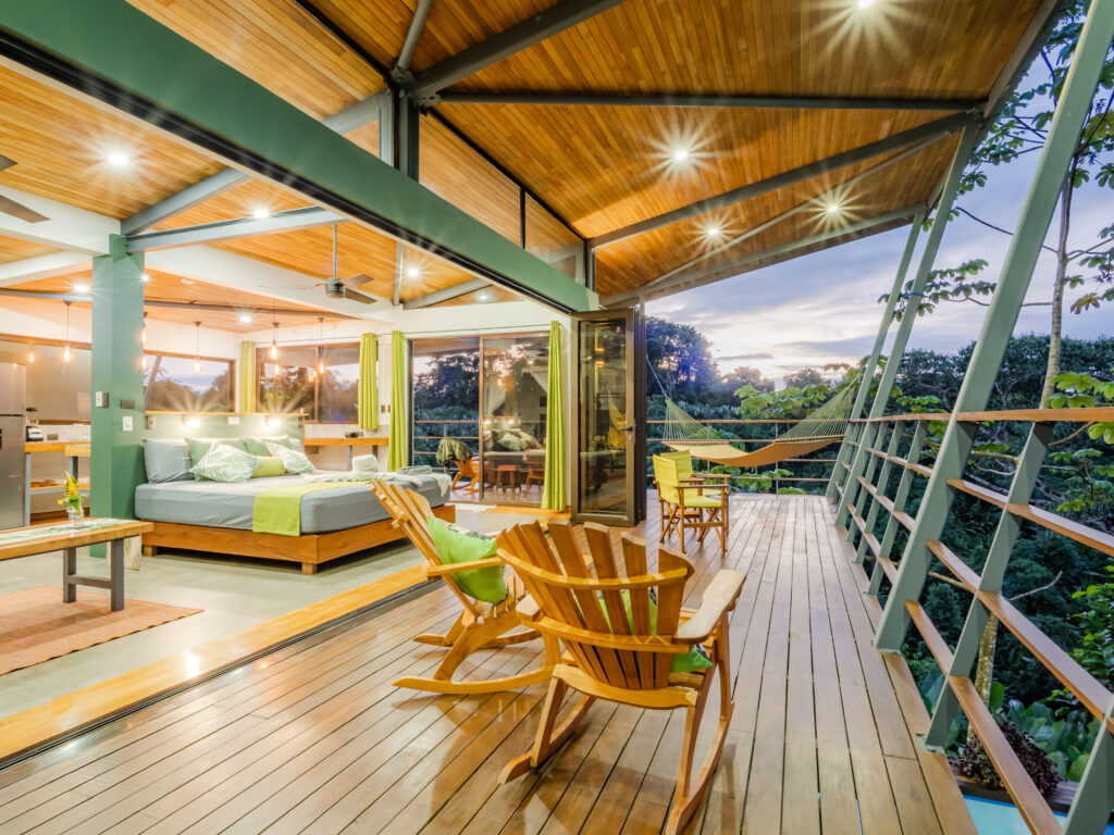 Large wraparound deck with jungle views and seating
