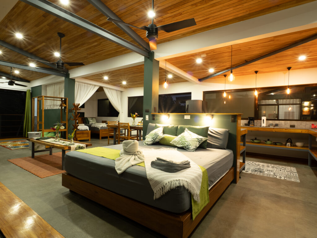 King sized bed in ocean view penthouse suite