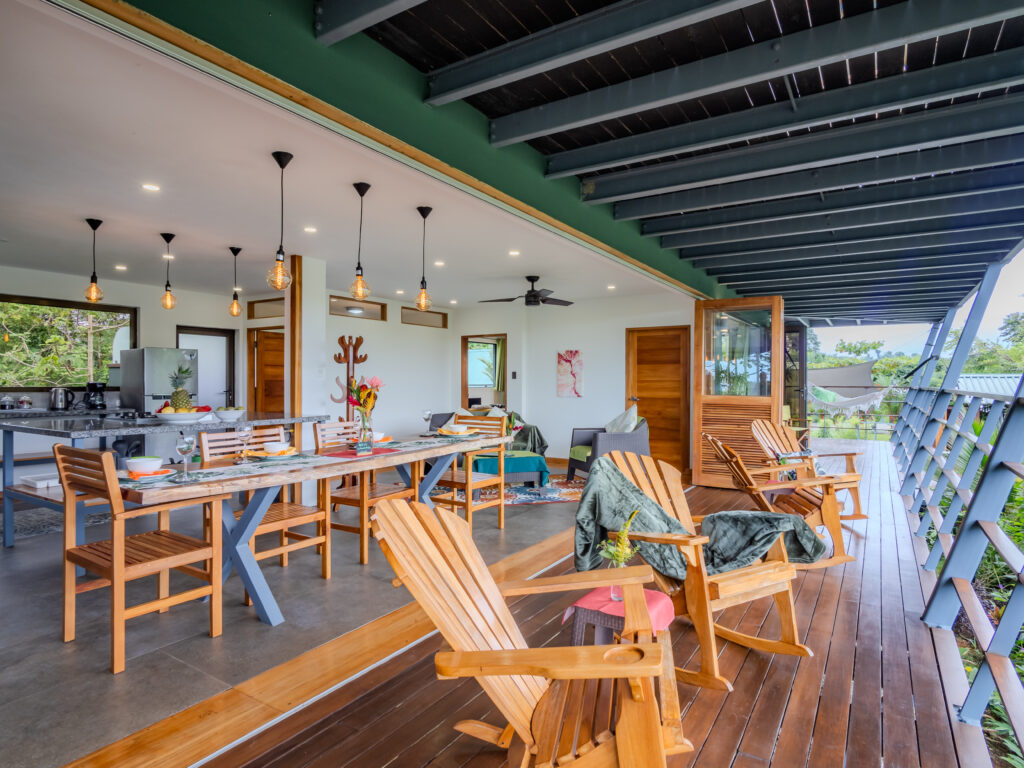 Spacious living area and wraparound deck in Jungle Suite, Drake Bay