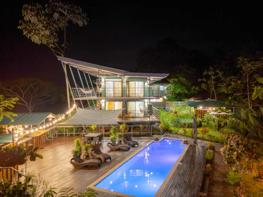 Luxury lodge with large pool surrounded by the rainforest
